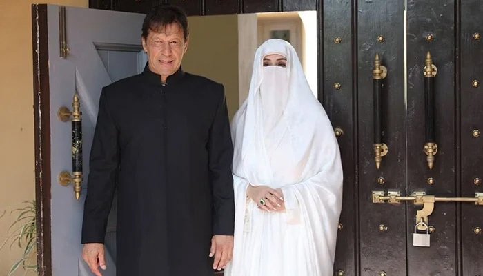 Former prime minister Imran Khan (left) and his wife Bushra Bibi. — Twitter/PTI/File