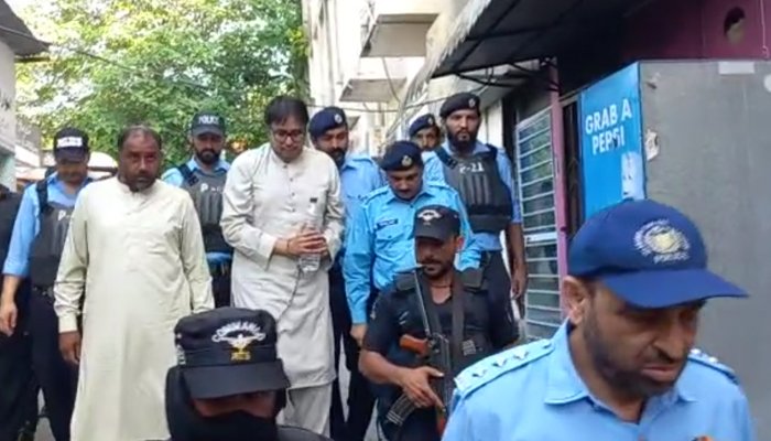 PTI leader Shahbaz Gill being taken to a court in Islamabad, on August 10, 2022. — Photo by author
