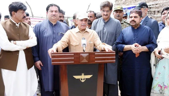 PM Shehbaz talking to media at a relief camp in the Gul Mohaamed Uplano village. — PID