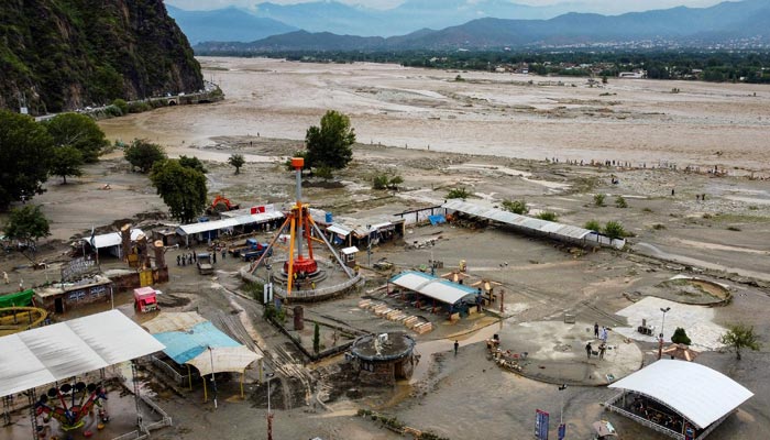 A general view of flooding pictured in Mingora a town in the Pakistan´s northern Swat Valley following heavy monsoon rainfall on August 27, 2022. — AFP