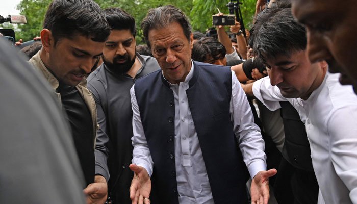 PTI Chairman Imran Khan arriving at an anti-terrorism court in Islamabad. — AFP/File