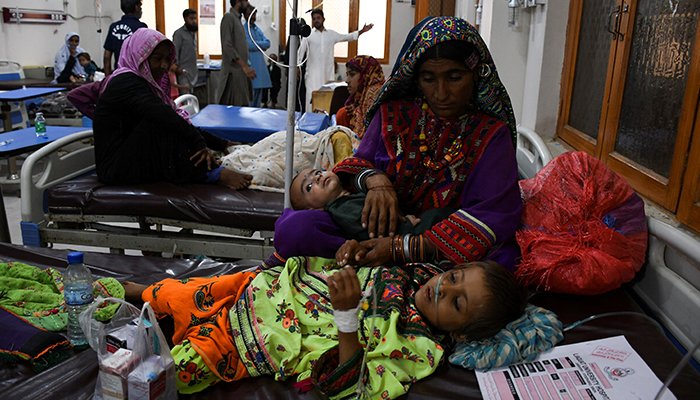 A woman, who became flood victim, takes care of her ailing baby at a hospital, following rains and floods during the monsoon season in Jamshoro, Pakistan September 20, 2022. — Reuters