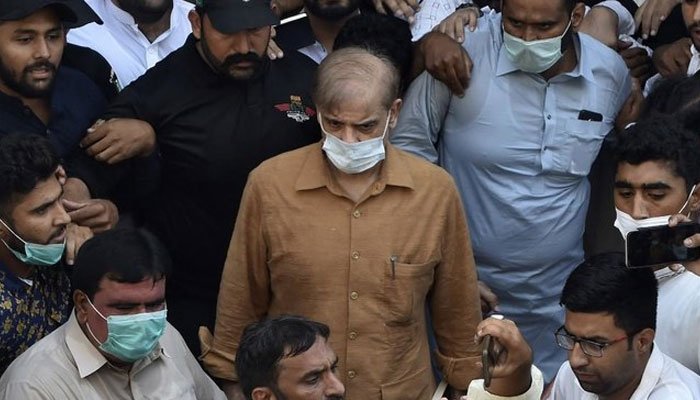 Prime Minister Shehbaz Sharif arrives at a court for hearing of money laundering case. — AFP/File