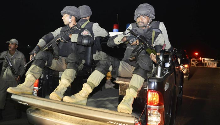 Law enforcement agency personnel prepare to conduct an operation against terrorists. — AFP/File