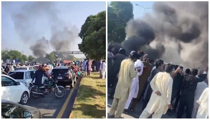 PTI supporters set tires ablaze as they stage a protest in Islamabad against the ECPs decision to disqualify PTI Chairman Imran Khan. — Screengrabs via Twitter