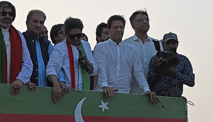 Former prime minister Imran Khan (3R), takes part in a protest rally in Attock on May 25, 2022. — AFP