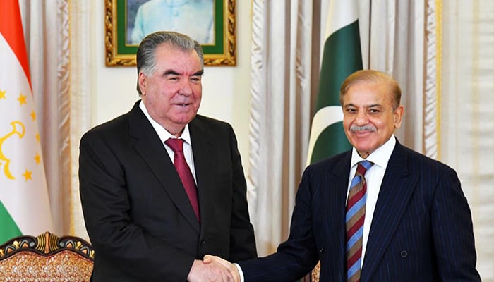 Prime Minister Muhamad Shehbaz Sharif and President of Tajikistan Emomali Rehmon shake hands after the sign Joint Communiqué of the visit of Tajik President to Pakistan in Islamabad on December 14, 2022. — Online