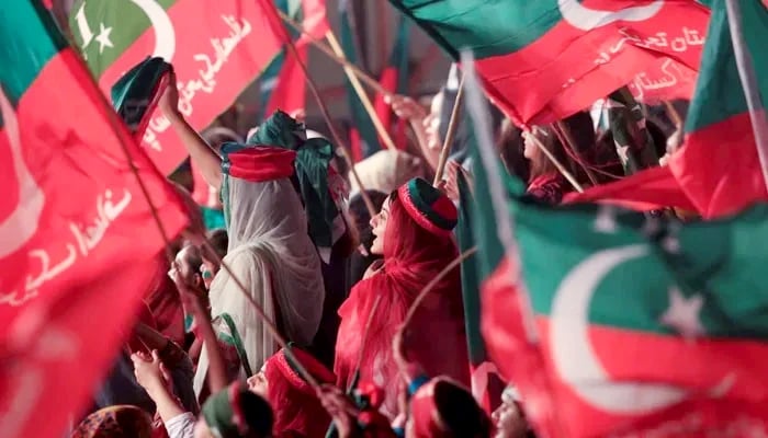 PTI workers and supporters attend a celebration rally in Islamabad on July 30, 2017. — Reuters