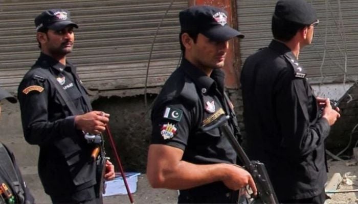 Policemen patrol an area after an attack in Swat. — AFP/File