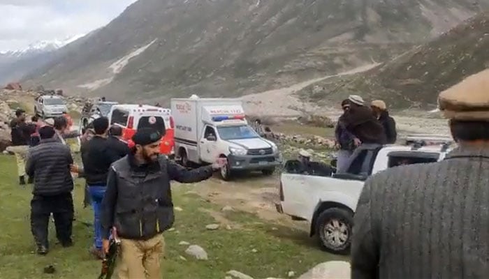 Rescue officials search for the avalanche victims in the Astore district in Pakistan’s northern Gilgit-Baltistan on May 27, 2023, in this still taken from a video. — Twitter/@iAliTajGB