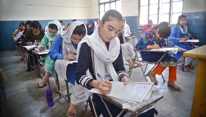 Students attempt the annual board exams at Government Girls Higher Secondary School on Murree Road, Rawalpindi on May 18, 2022. — APP/File