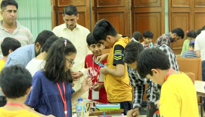 A representational image of kids involved in science activities. — paksc.org