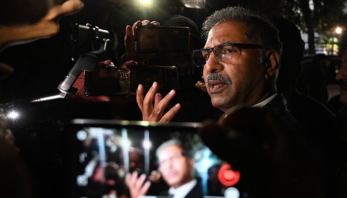 PTI s legal team member Ali Zafar speaks to media outside the Supreme Court building in Islamabad on January 13, 2024. — AFP